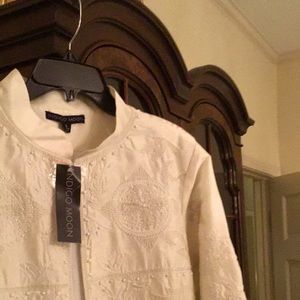 Ivory 3/4 length jacket.